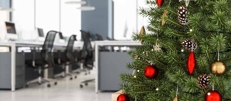 Empty office with Christmas tree
